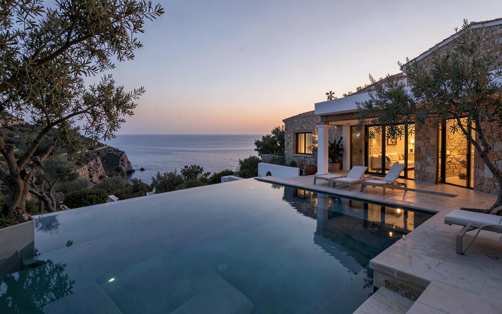 A luxury Mallorca villa terrace and pool at golden hour